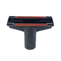 Furniture nozzle with lint strip